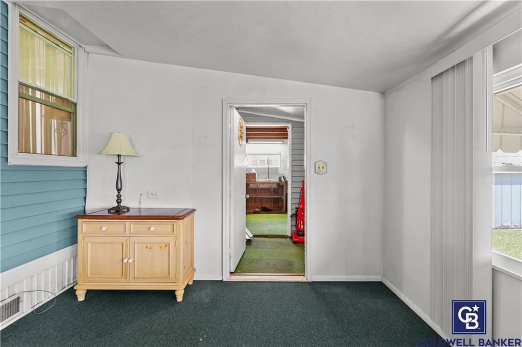 437 Blue Jay Lane Apollo, PA 15613 - Photo 8 of 30 a room that has a bed and a table in it