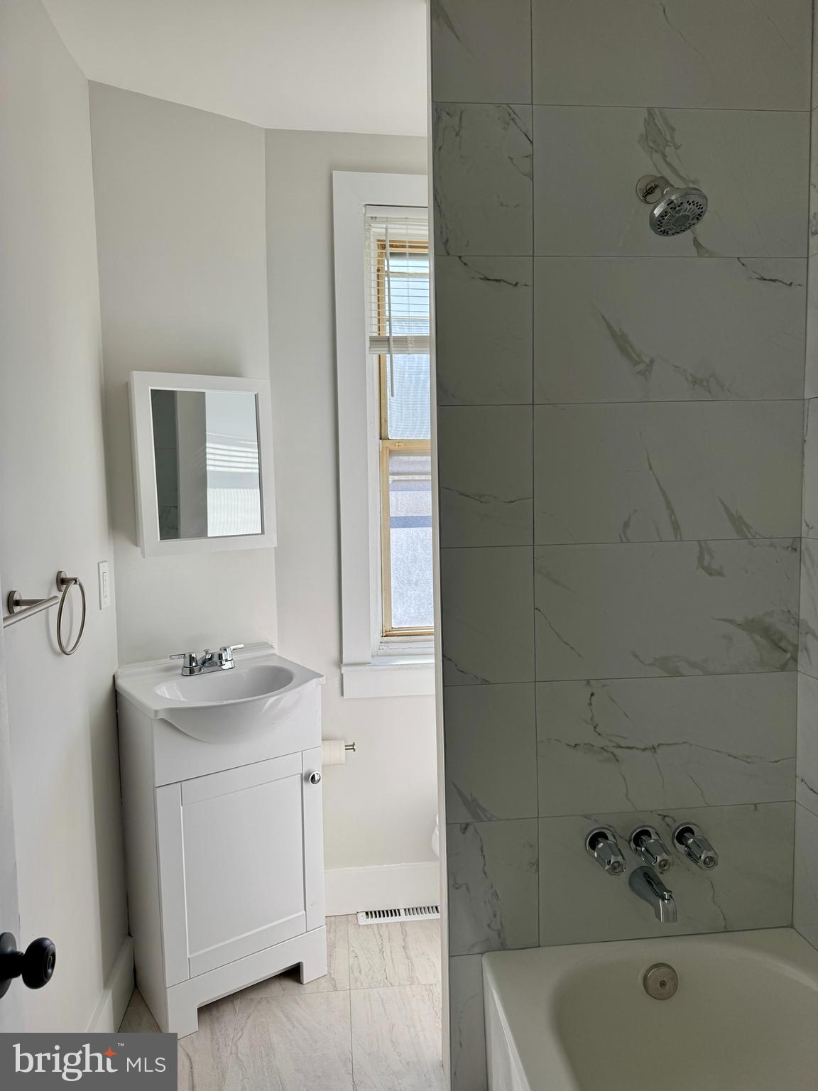 6308 North Lambert Street Philadelphia, PA 19138 - Photo 13 of 21 a bathroom with a sink a toilet and shower