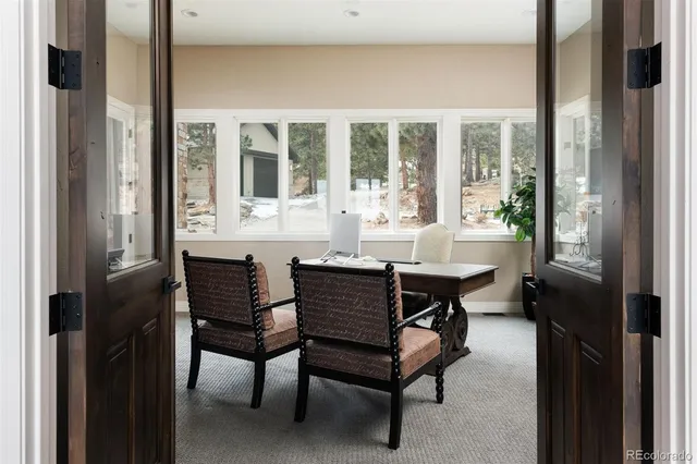 a workspace with furniture and window