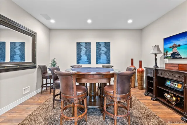 a bedroom with a bed and dresser