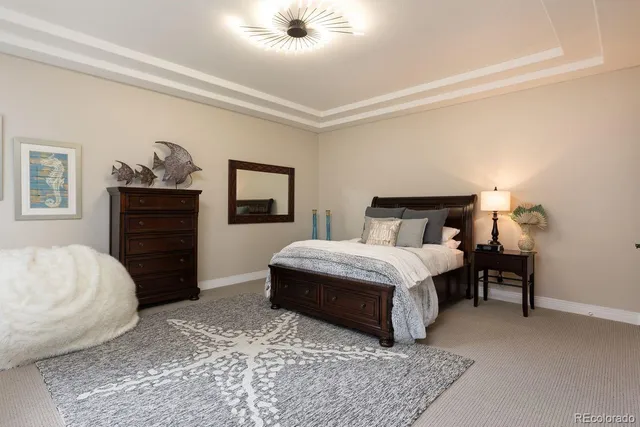 a bathroom with a sink a mirror and a shower