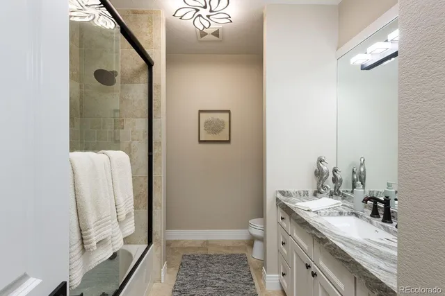 a bed room with a bed and a window