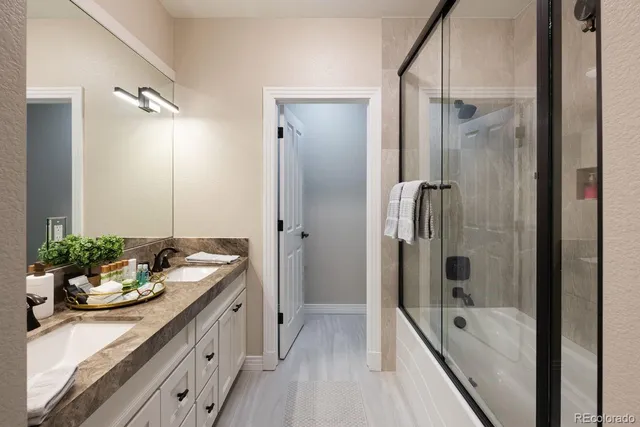 a living room with furniture window and a flat screen tv