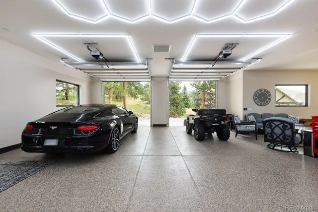 a view of living room with patio furniture and a yard