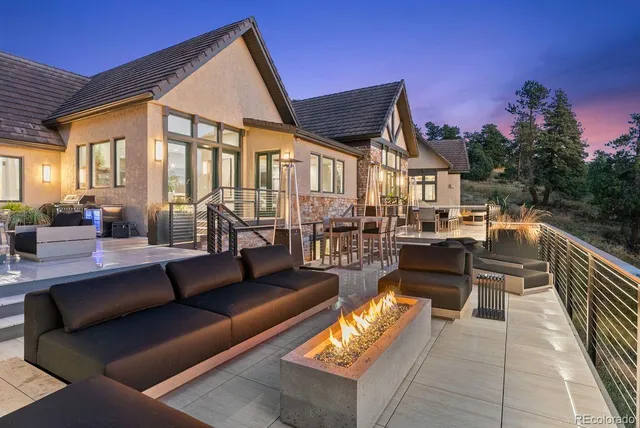 a view of a patio with swimming pool