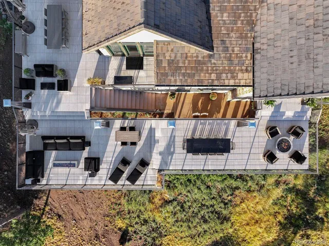 an aerial view of residential house with outdoor space