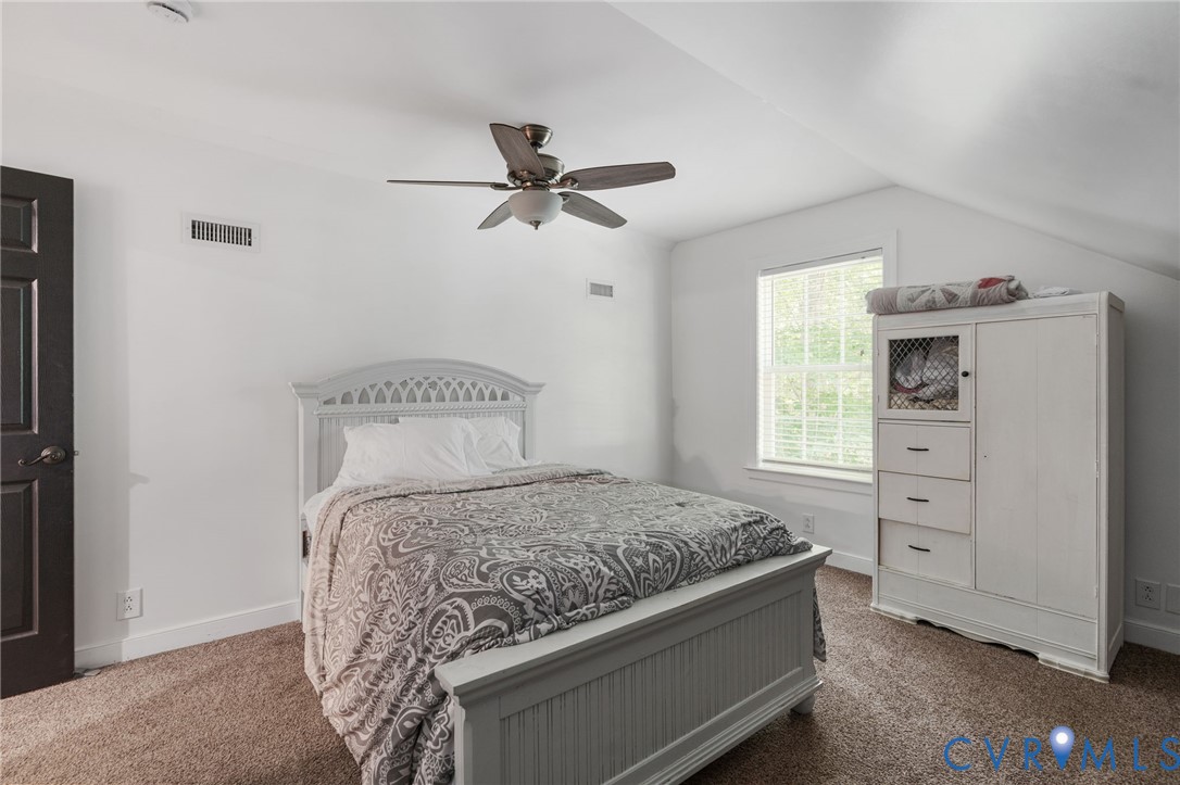 1755 Dispatch Road Quinton, VA 23141 - Photo 57 of 86 a bedroom with a bed and a window
