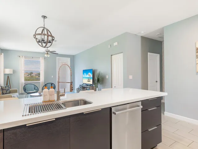 a very nice looking dining room with a table and chairs