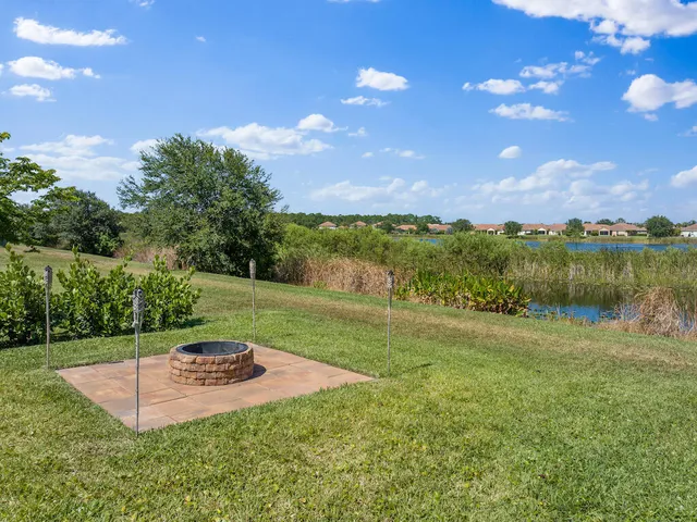 a view of a lake with a yard