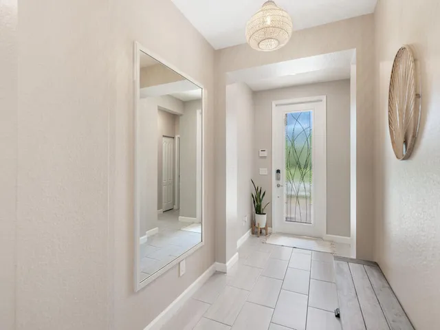 a view of a bathroom from a hallway