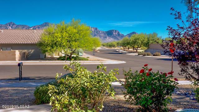 3701 East Northern Dancer Road Tucson, AZ 85739 - Photo 2 of 32 a view of a street with a building in front of it