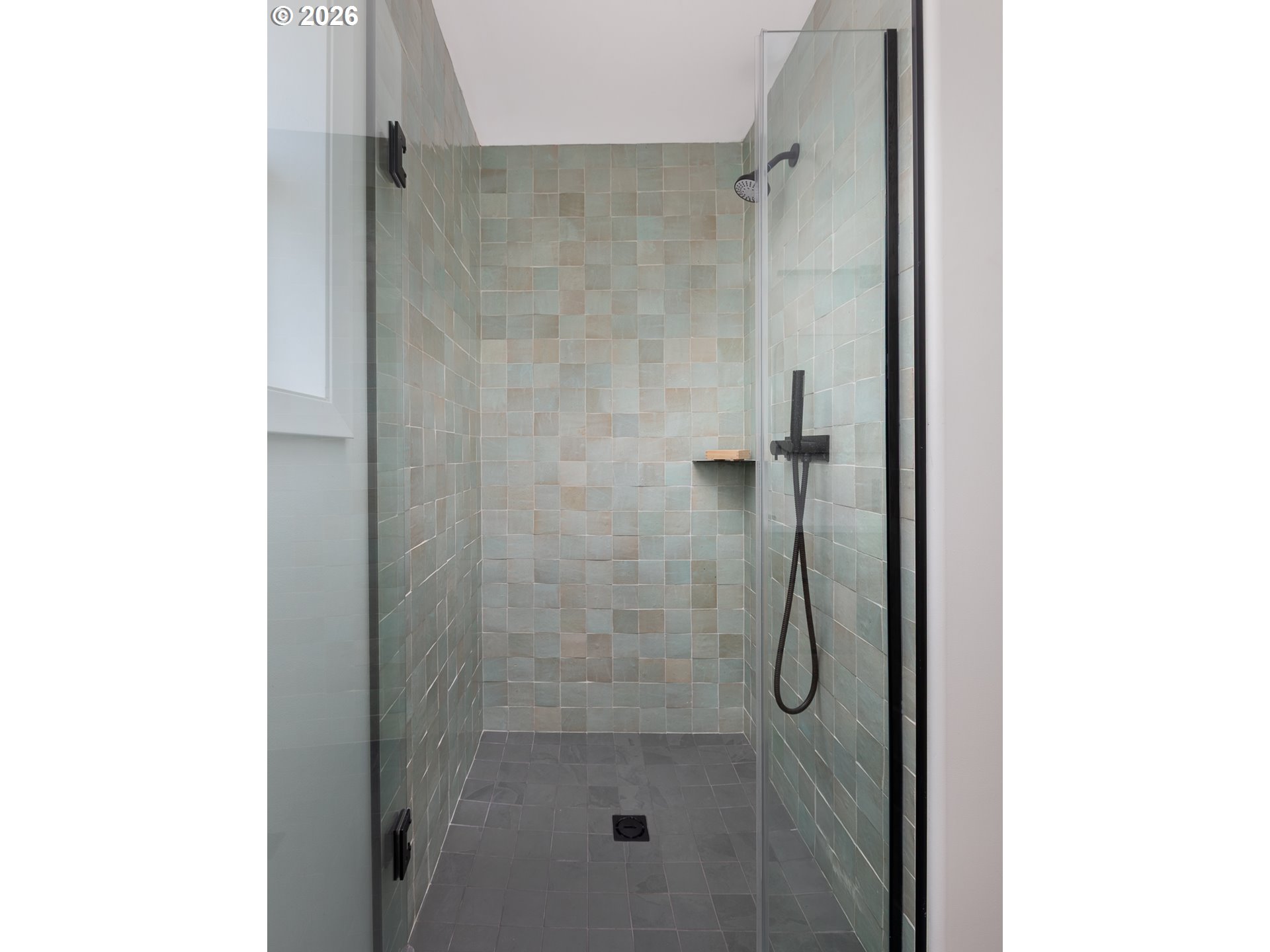 34098 Brooten Road Pacific City, OR 97135 - Photo 22 of 38 a bathroom with a glass shower door