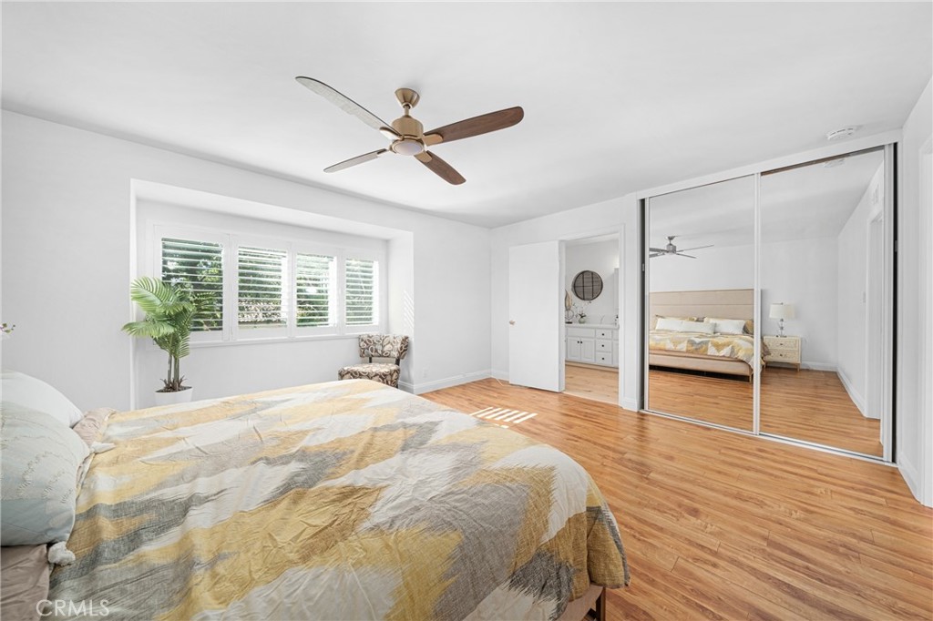 60 Willow Tree Lane Irvine, CA 92612 - Photo 13 of 32 a spacious bedroom with a bed and a window