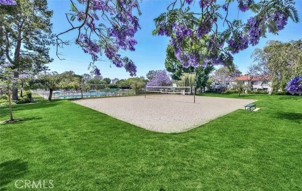 60 Willow Tree Lane Irvine, CA 92612 - Photo 31 of 32 a view of a backyard with large trees
