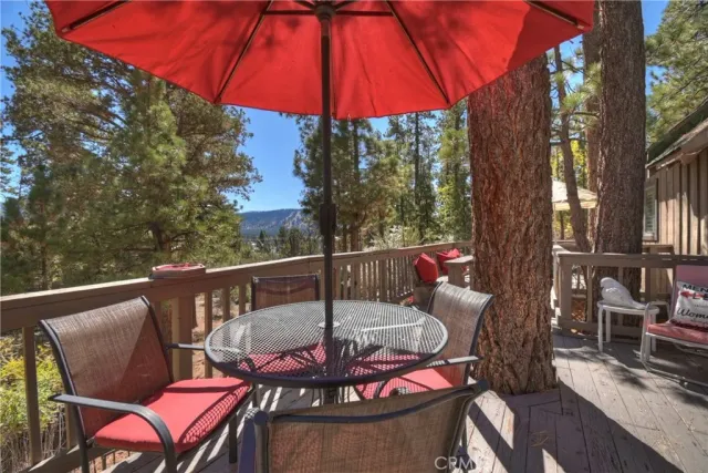 a view of a city with lush green forest