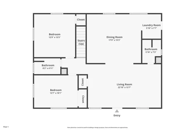 a view of a house with a yard covered in snow