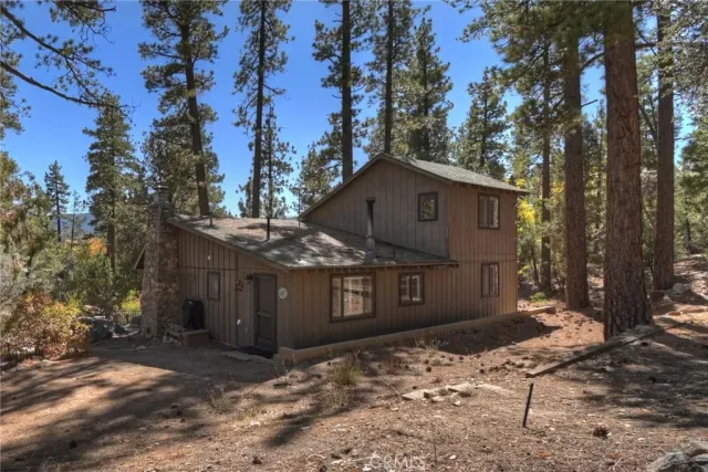 a house with trees in front of it