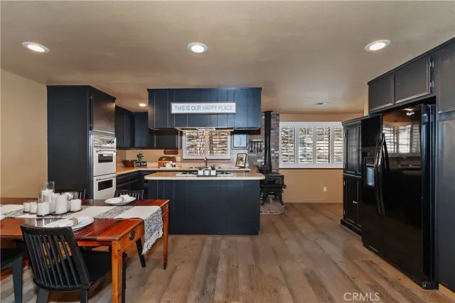 a dining room with table and chairs