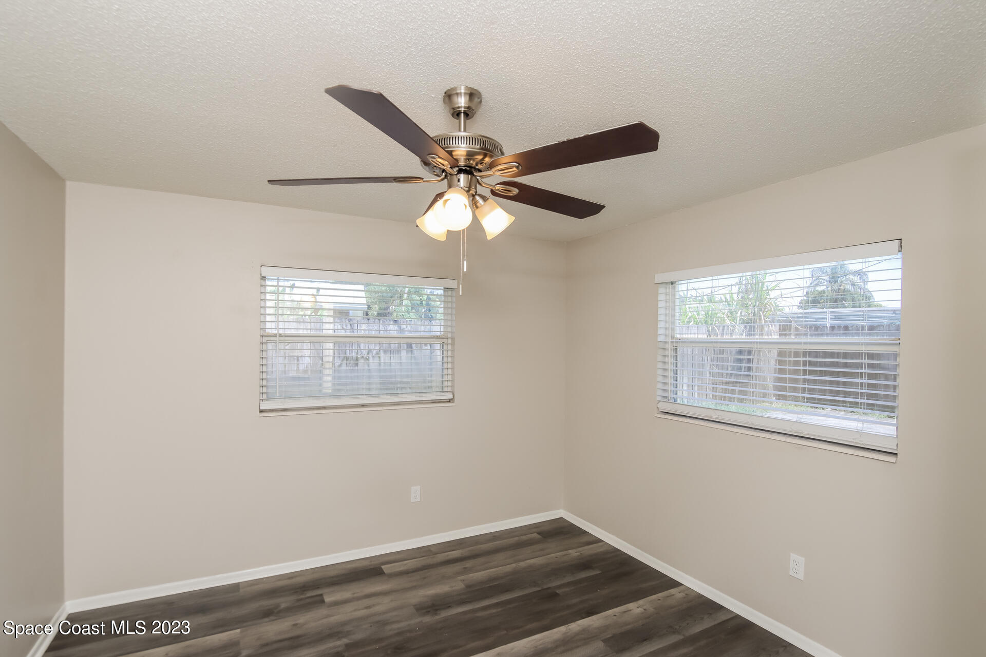 2389 Ricky Road Melbourne, FL 32935 - Photo 11 of 16 a view of an empty room with a window