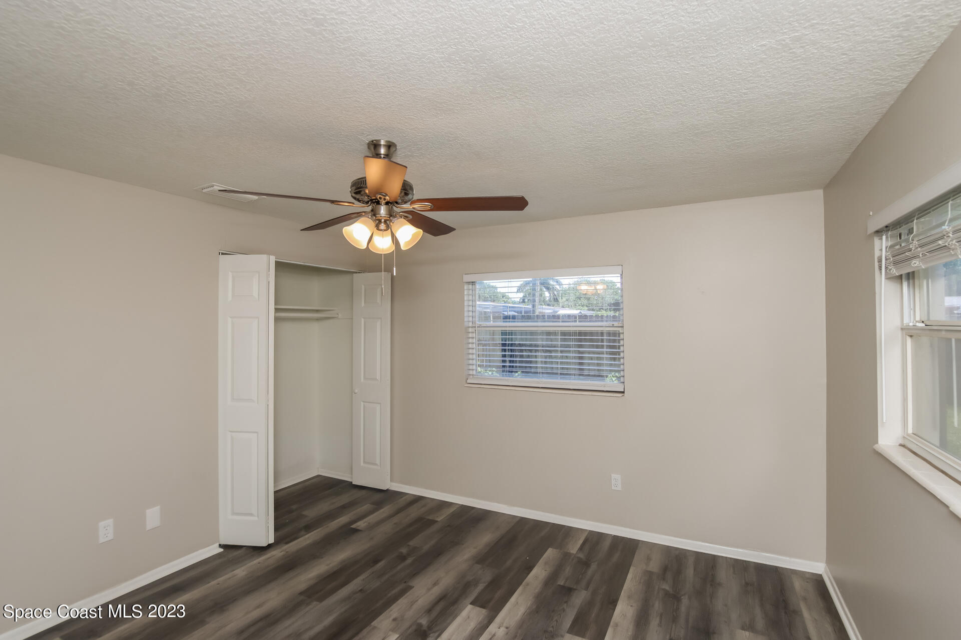2389 Ricky Road Melbourne, FL 32935 - Photo 7 of 16 a very nice looking room with a window