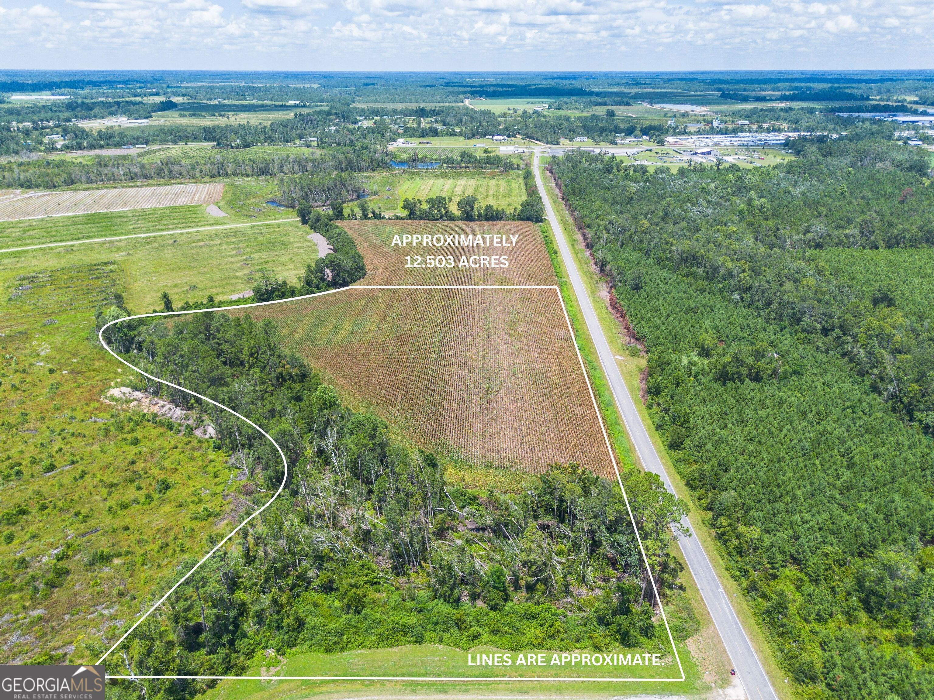 600 Teakwood Road Alma, GA 31510 - Photo 1 of 3 a view of a tennis court