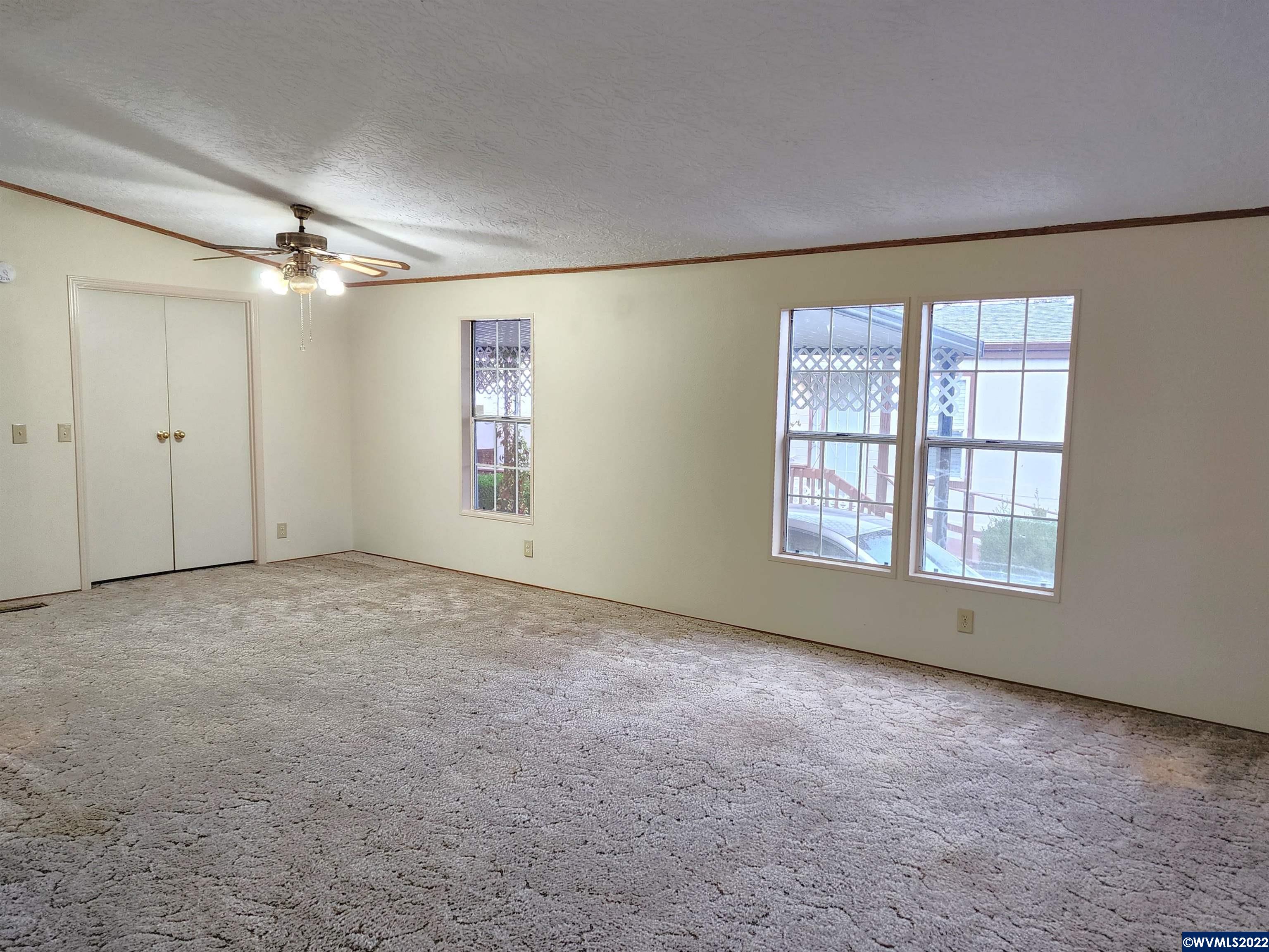 205 Boone Road Southeast, Unit 58 Salem, OR 97306 - Photo 10 of 19 a view of an empty room with a window