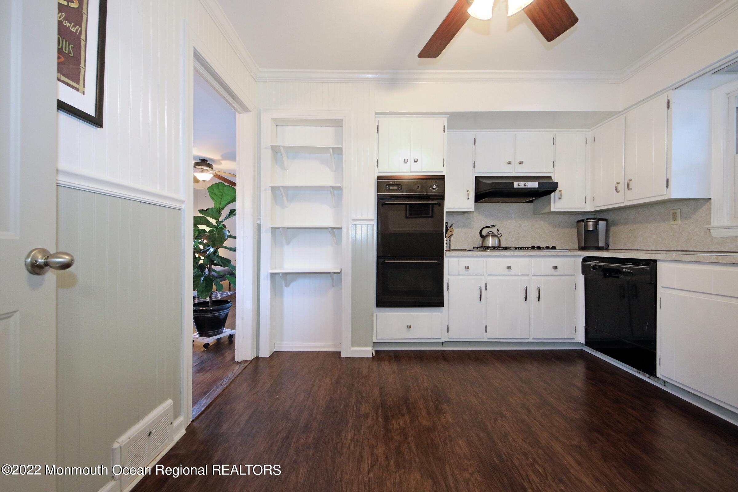 18 Crestview Drive Middletown, NJ 07748 - Photo 13 of 20 a kitchen with stainless steel appliances a refrigerator sink and stove