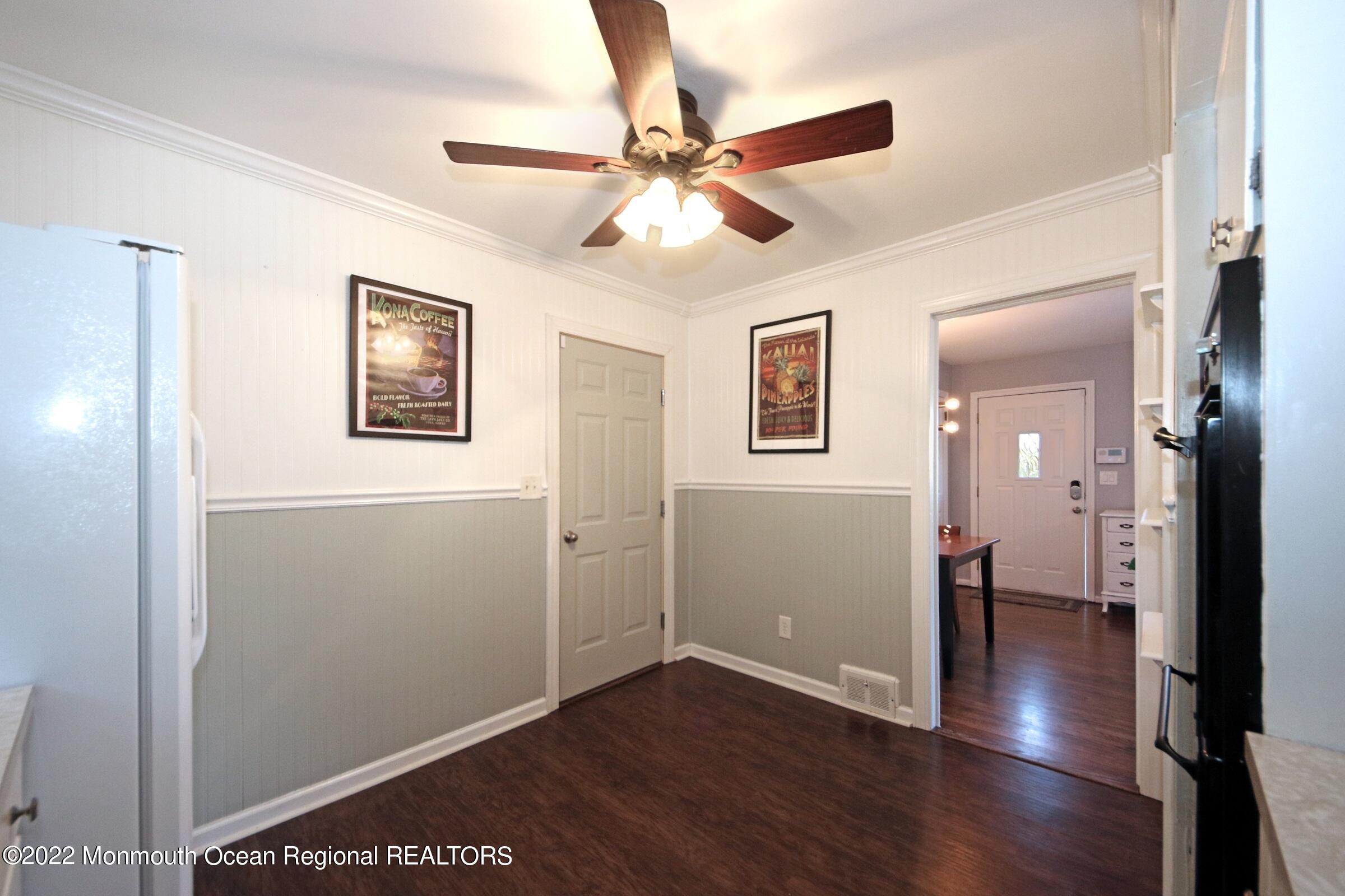 18 Crestview Drive Middletown, NJ 07748 - Photo 15 of 20 a view of a hallway with wooden floor