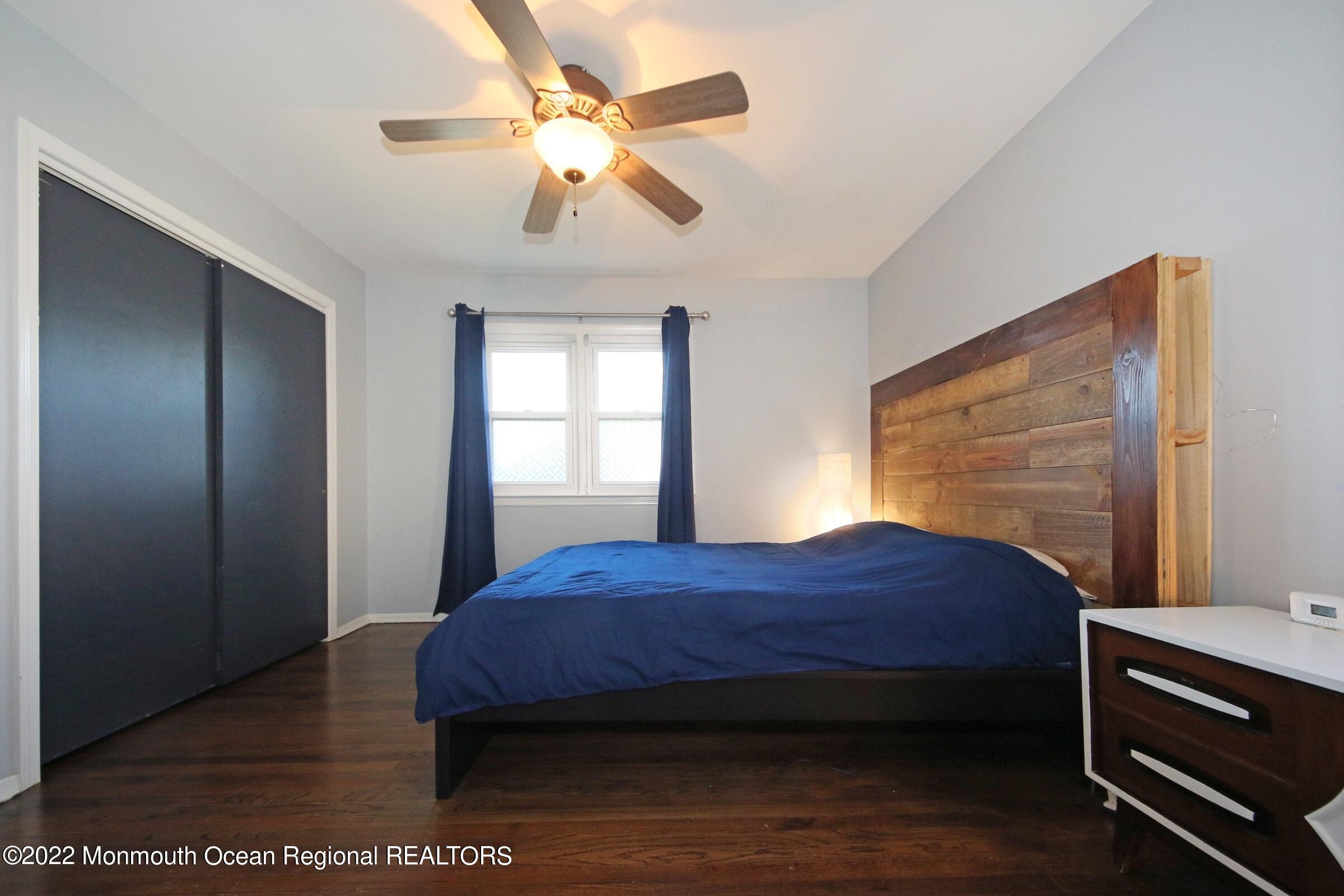 18 Crestview Drive Middletown, NJ 07748 - Photo 17 of 20 a bedroom with a bed and a window