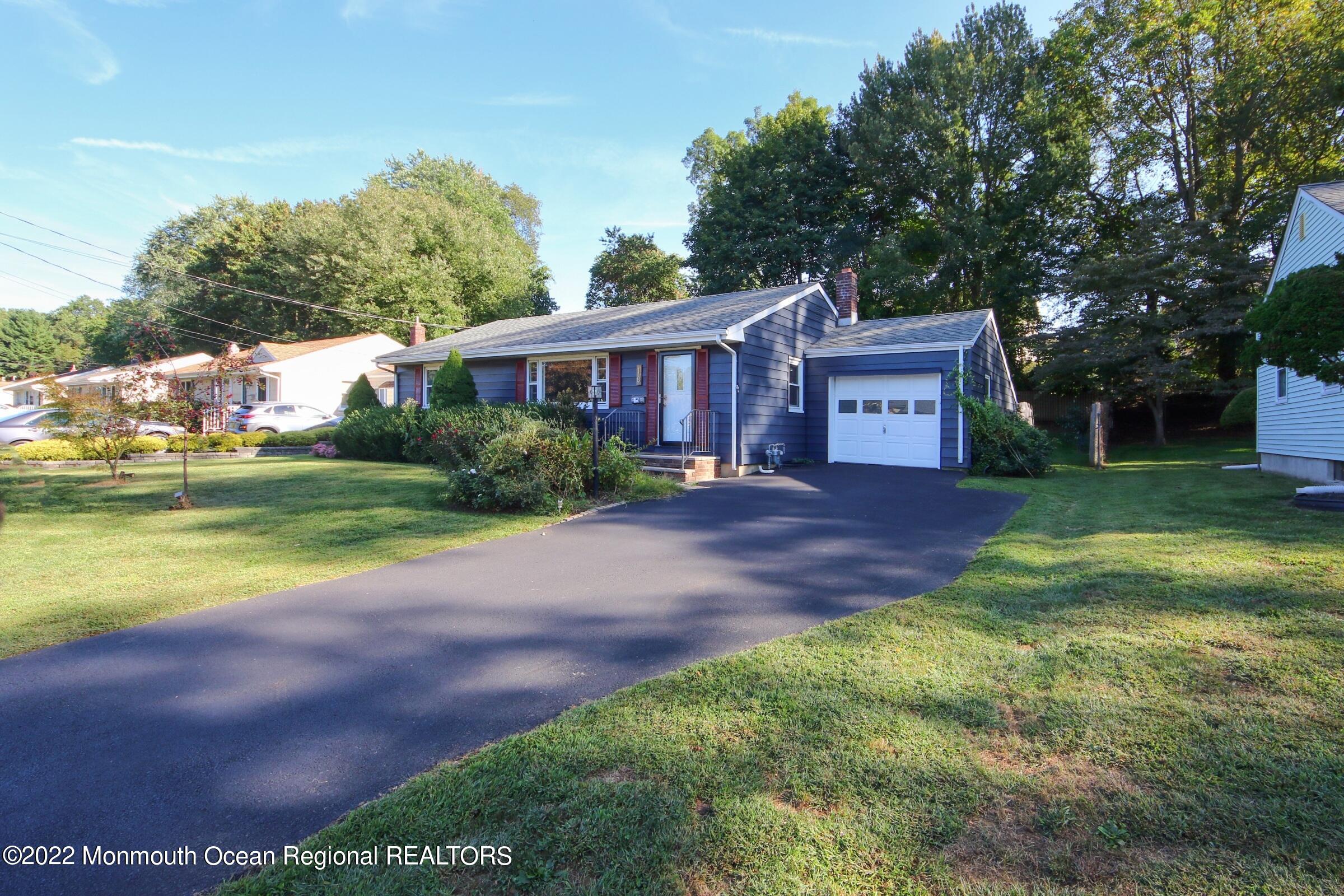 18 Crestview Drive Middletown, NJ 07748 - Photo 4 of 20 a view of an house with backyard and garden