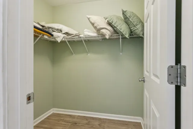 a roof deck with a table and chairs