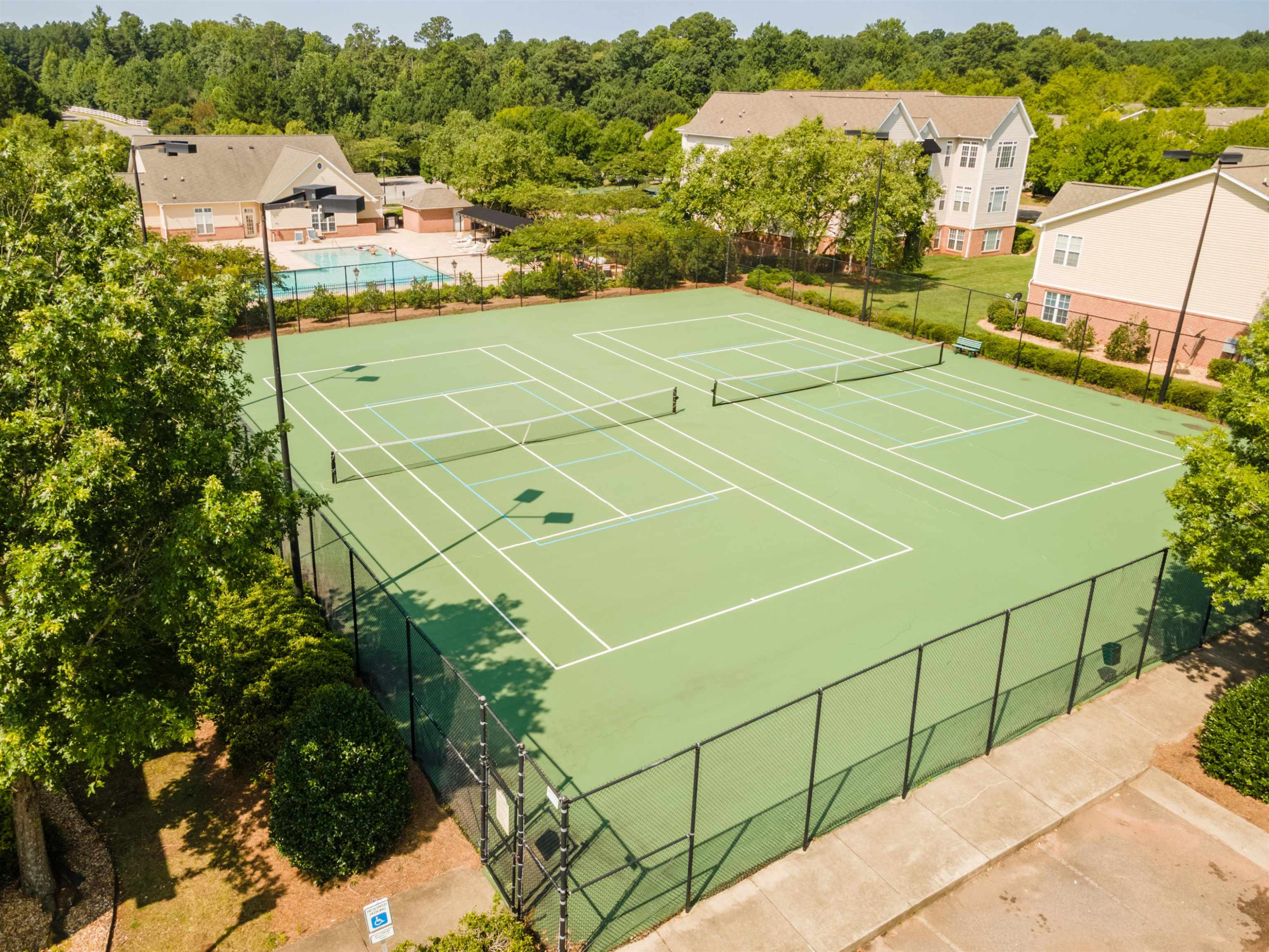 2511 Huntscroft Lane, Unit 201 Raleigh, NC 27617 - Photo 29 of 34 a view of a tennis court