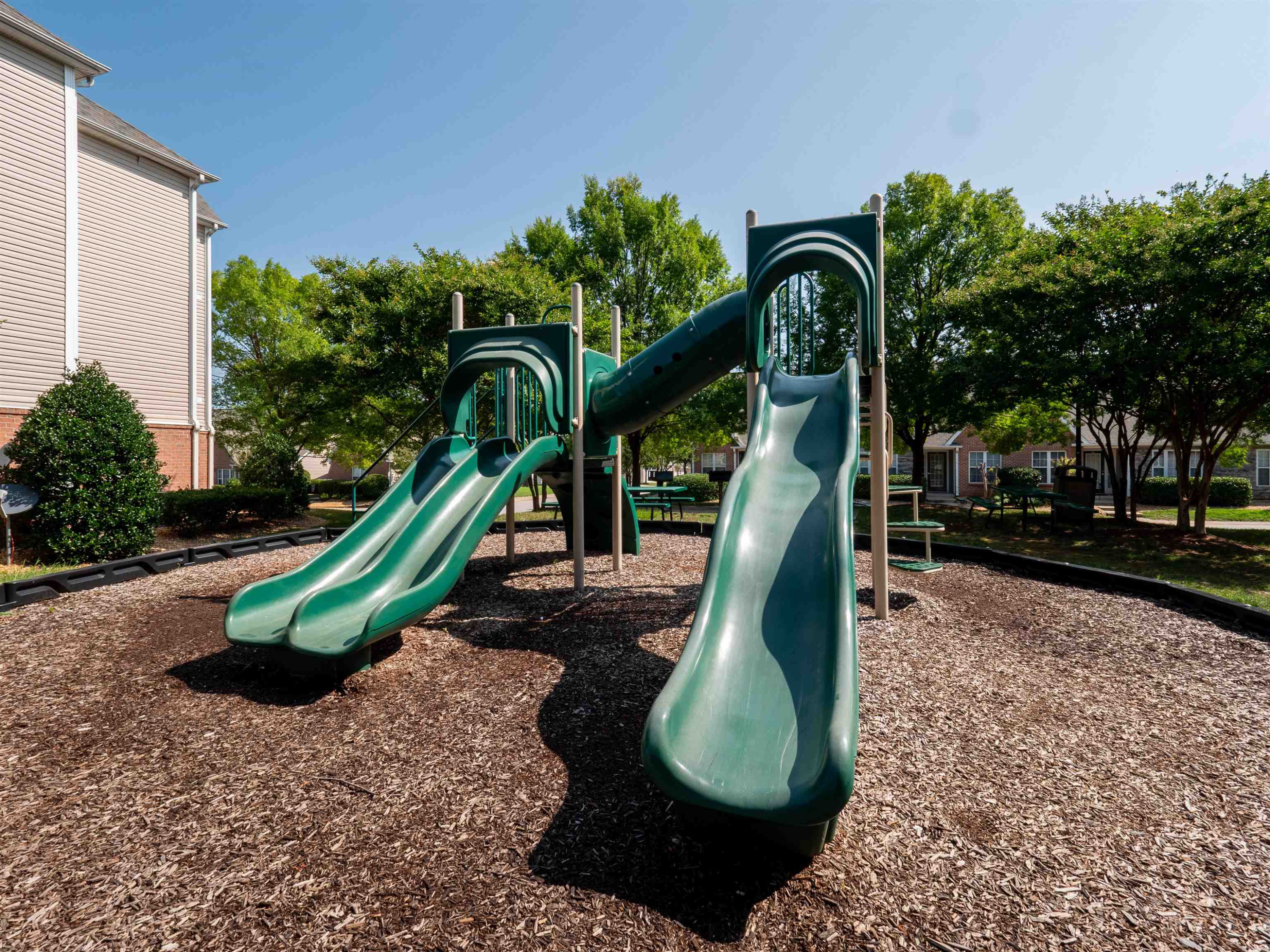 2511 Huntscroft Lane, Unit 201 Raleigh, NC 27617 - Photo 31 of 34 a view of a park with a slide