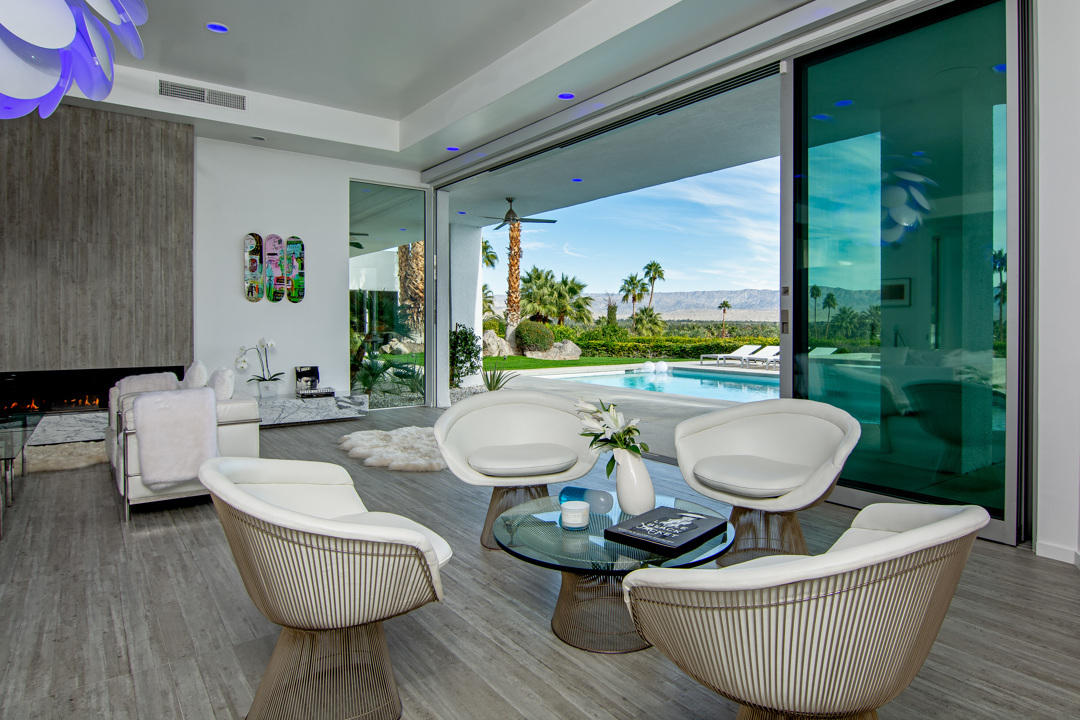 70288 Pecos Road Rancho Mirage, CA 92270 - Photo 15 of 76 a living room with furniture and a large window
