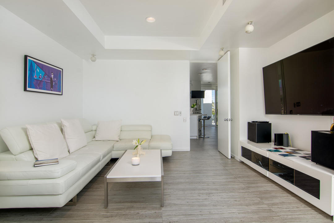 70288 Pecos Road Rancho Mirage, CA 92270 - Photo 41 of 76 a living room with furniture and a flat screen tv