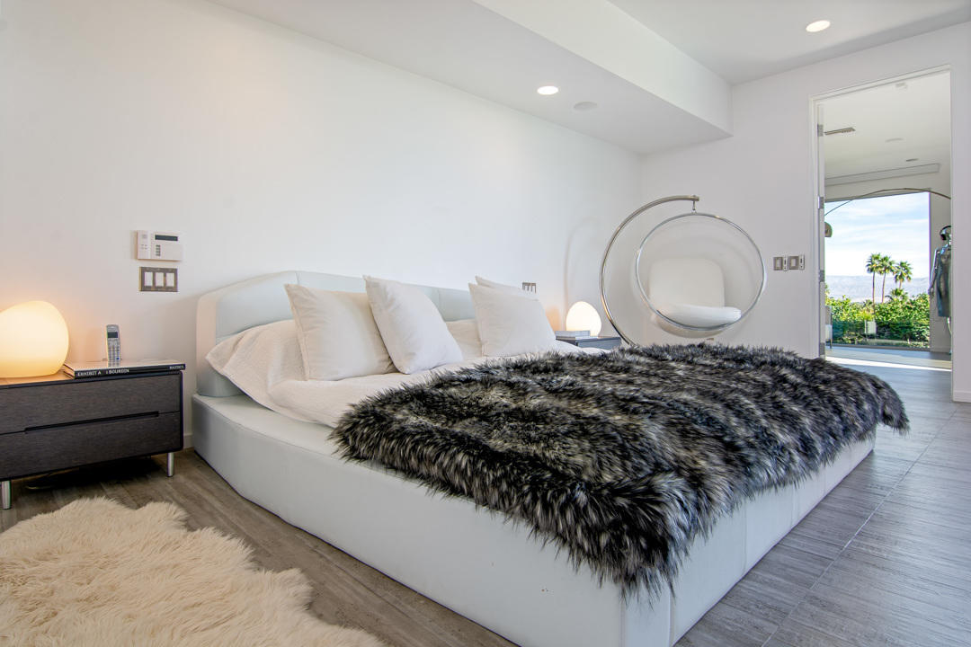 70288 Pecos Road Rancho Mirage, CA 92270 - Photo 47 of 76 a bed room with a bed and a large window