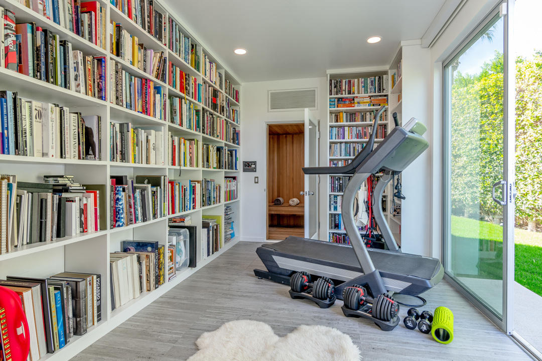 70288 Pecos Road Rancho Mirage, CA 92270 - Photo 55 of 76 a view of a bedroom with furniture and book shelf