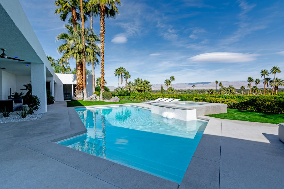 70288 Pecos Road Rancho Mirage, CA 92270 - Photo 57 of 76 a view of a swimming pool with a patio