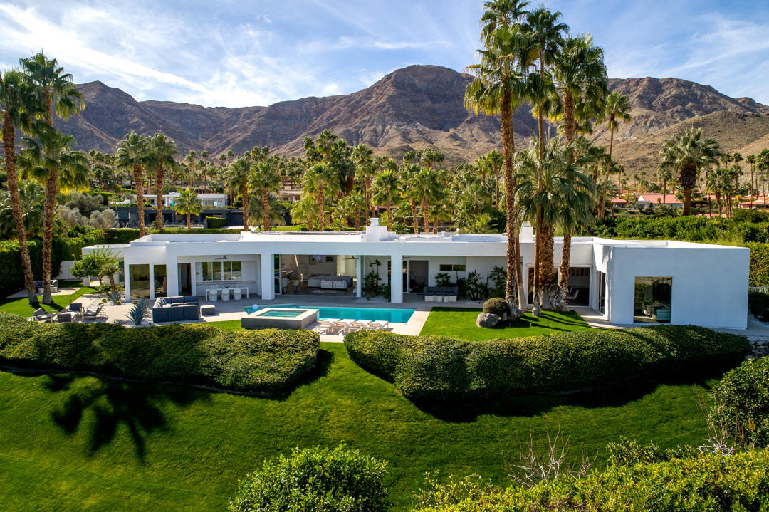 70288 Pecos Road Rancho Mirage, CA 92270 - Photo 60 of 76 a view of a house with a garden and a yard