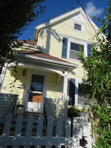 a front view of a house with balcony