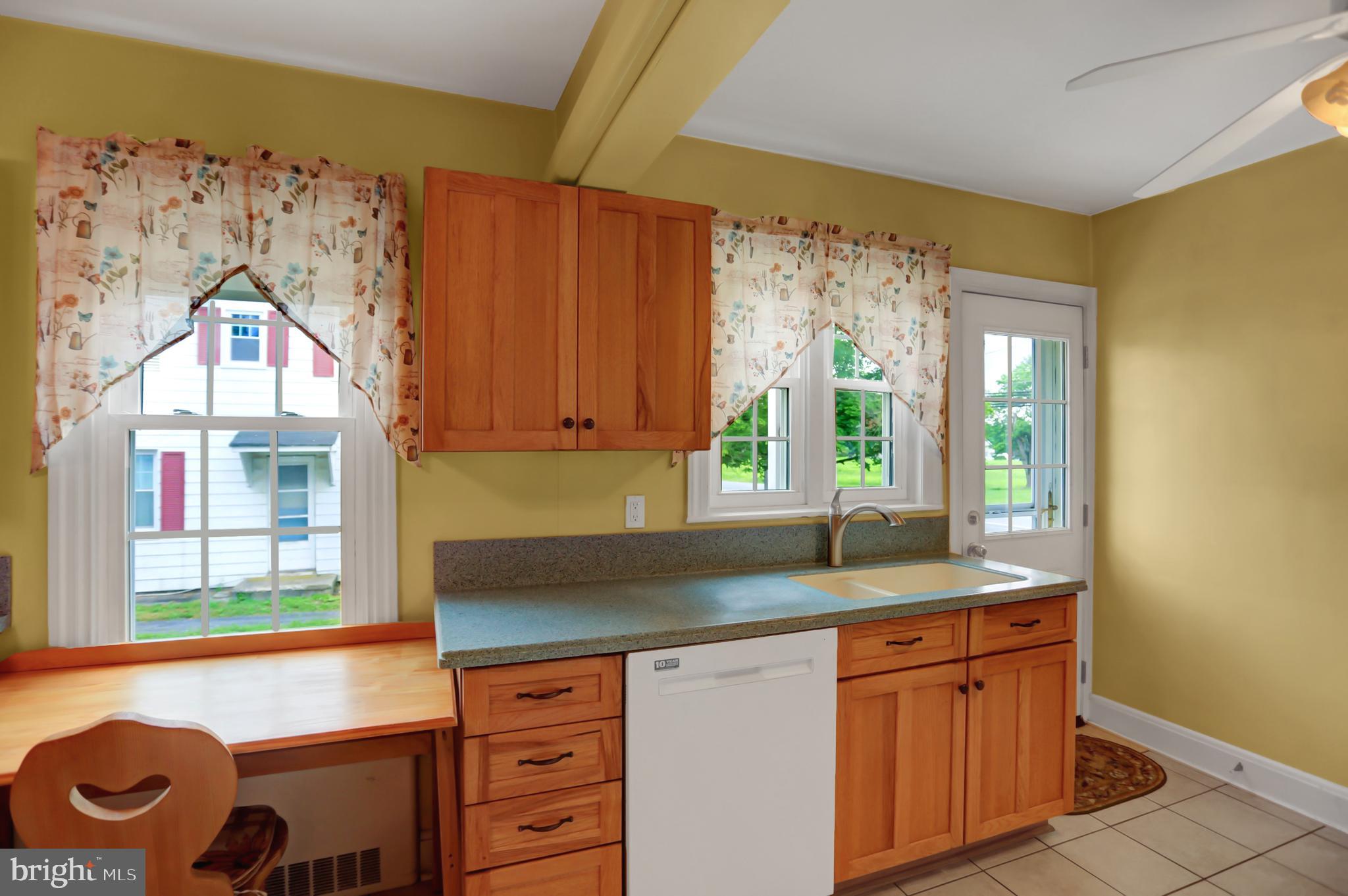 6119 Middleburg Road Keymar, MD 21757 - Photo 7 of 50 a kitchen with granite countertop cabinets and window