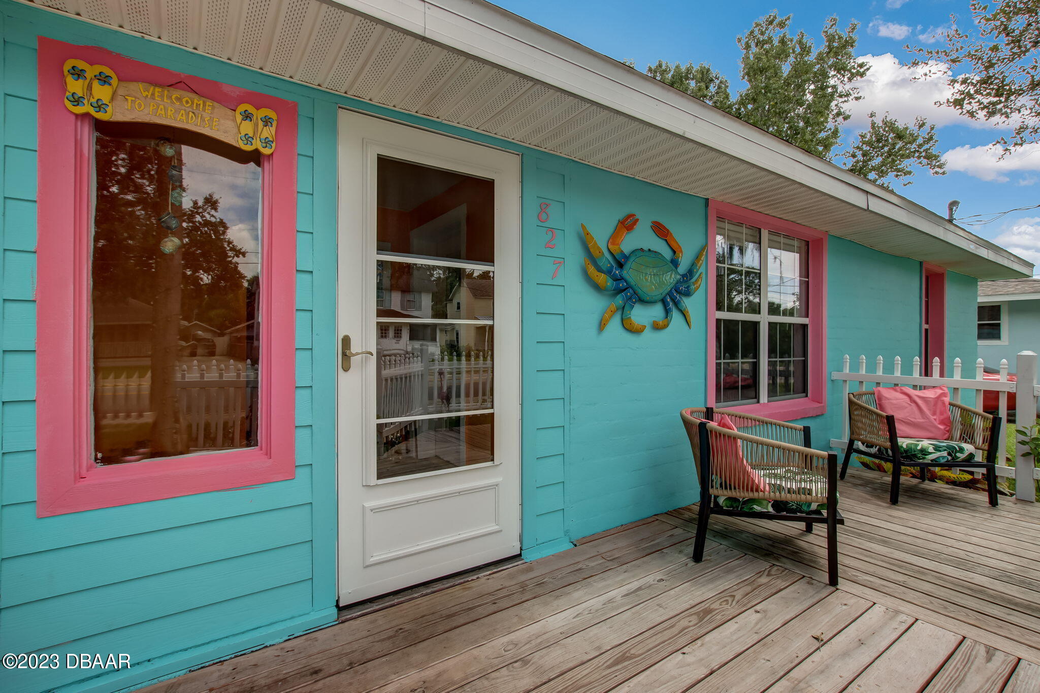 827 South Beach Street Daytona Beach, FL 32114 - Photo 2 of 40 a view of a two chairs in the balcony