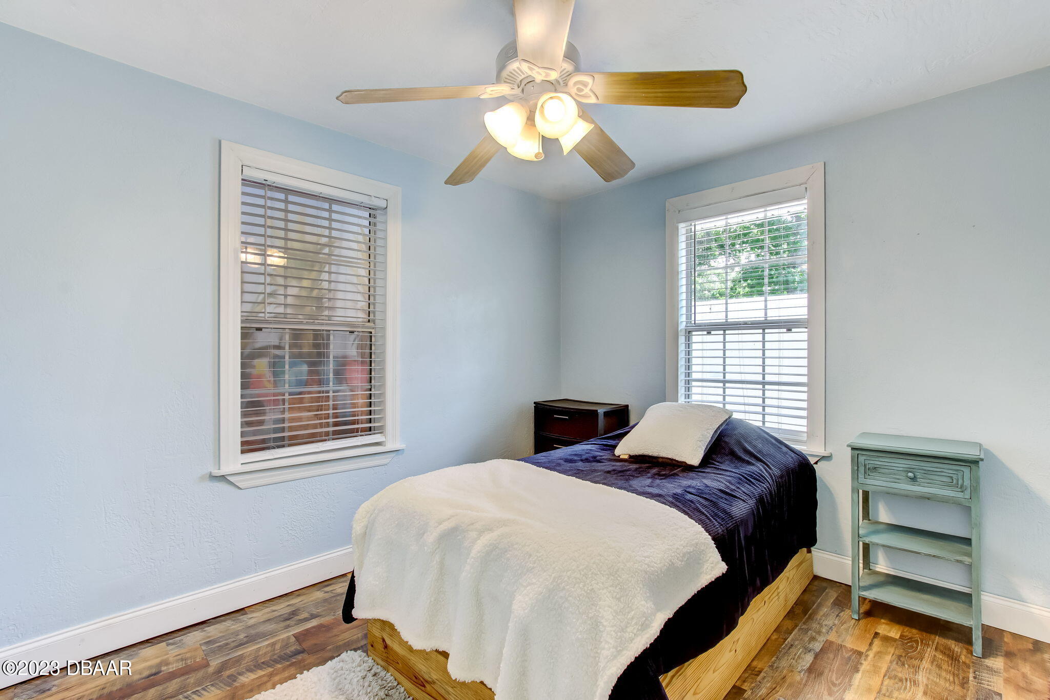 827 South Beach Street Daytona Beach, FL 32114 - Photo 23 of 40 a bedroom with a bed and a window