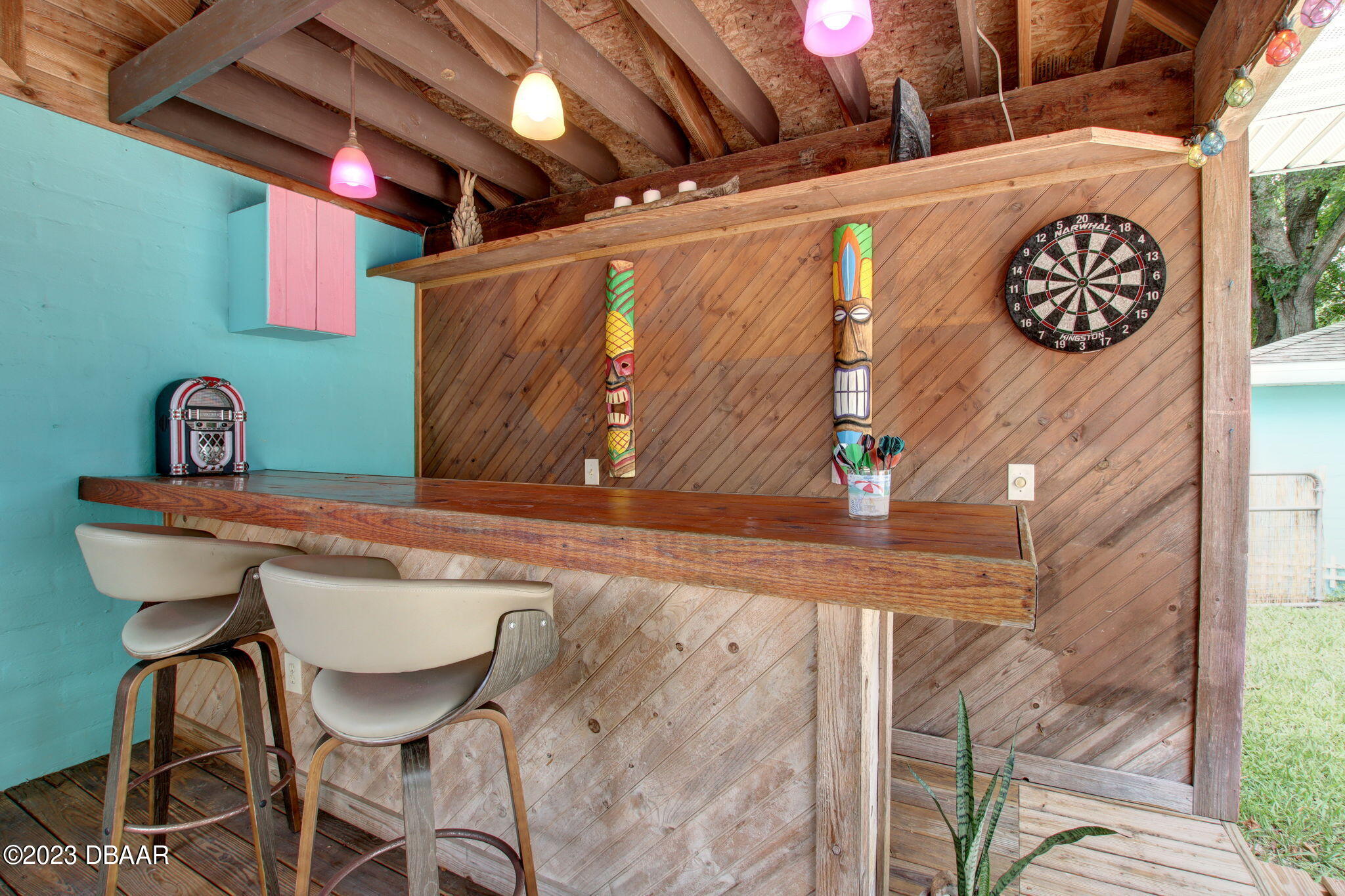 827 South Beach Street Daytona Beach, FL 32114 - Photo 28 of 40 a view of a chairs and table in a room