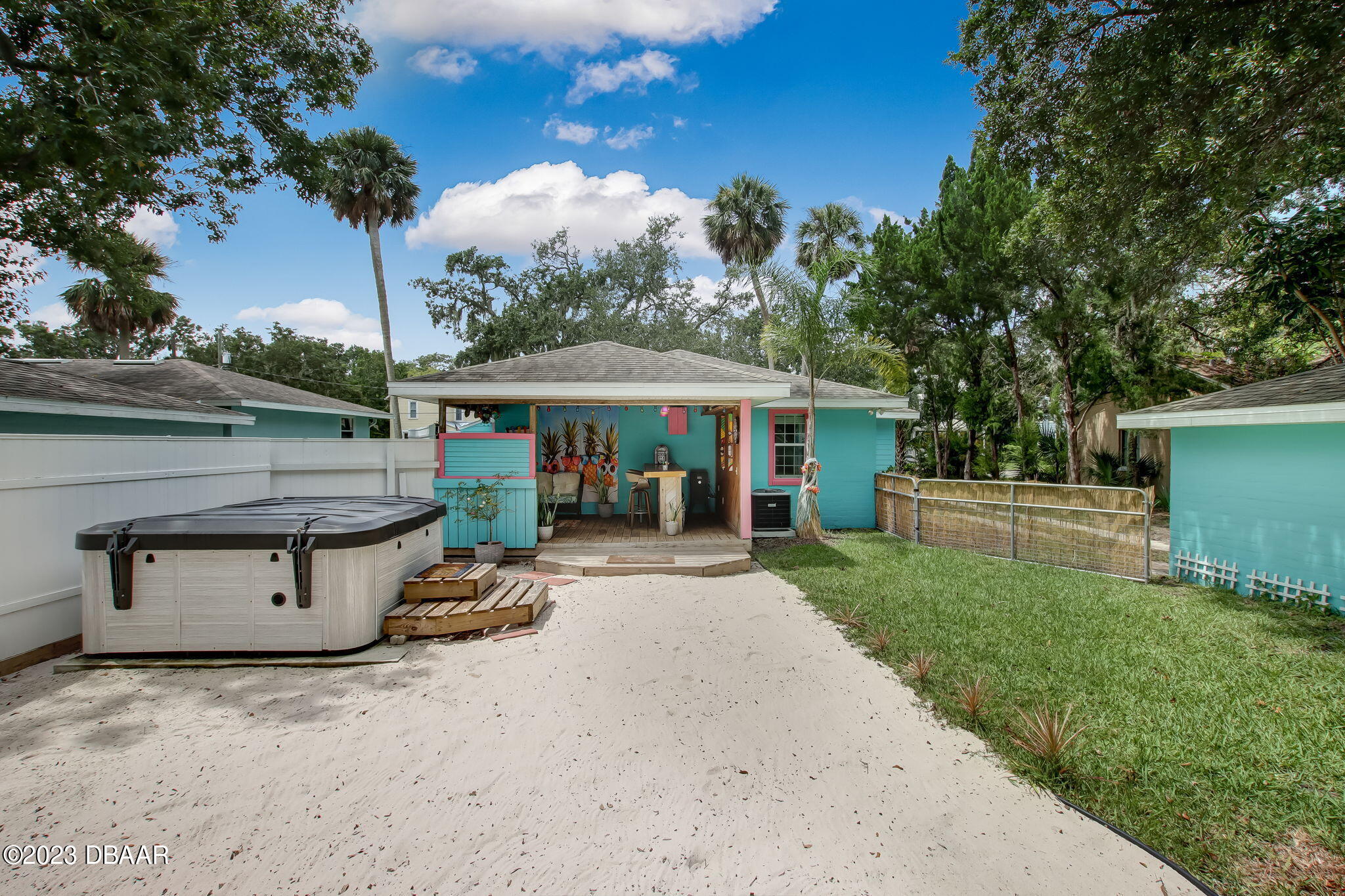 827 South Beach Street Daytona Beach, FL 32114 - Photo 29 of 40 a view of a house with backyard and sitting area
