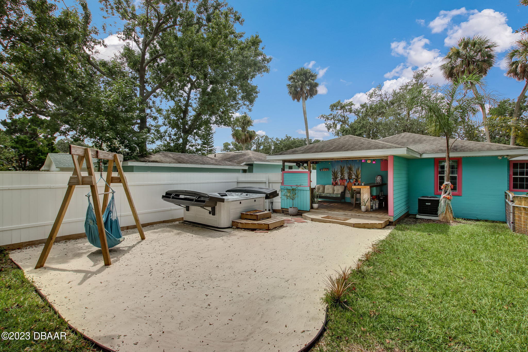 827 South Beach Street Daytona Beach, FL 32114 - Photo 32 of 40 a view of a house with patio