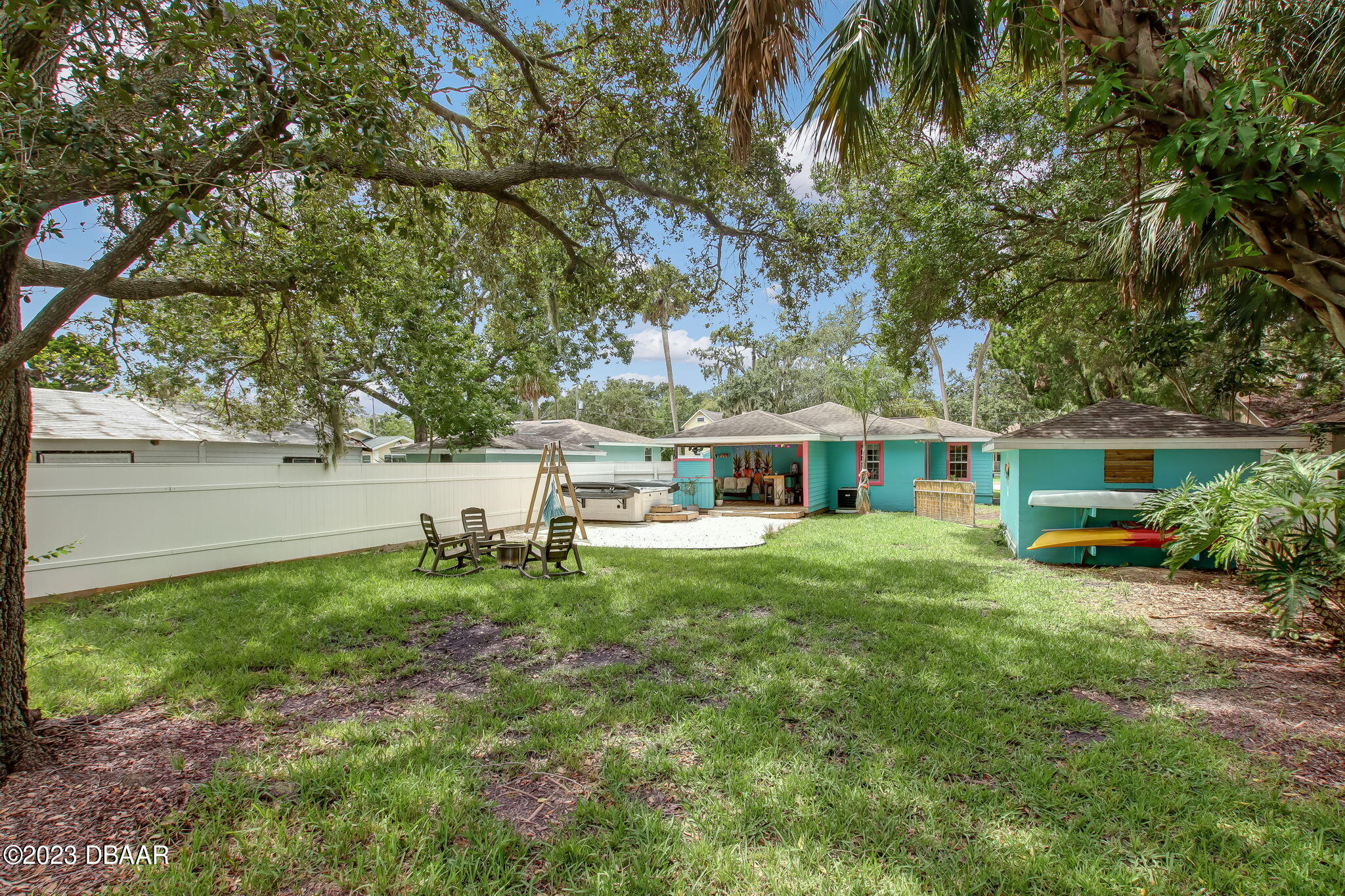 827 South Beach Street Daytona Beach, FL 32114 - Photo 36 of 40 a view of a house with a yard balcony and sitting area