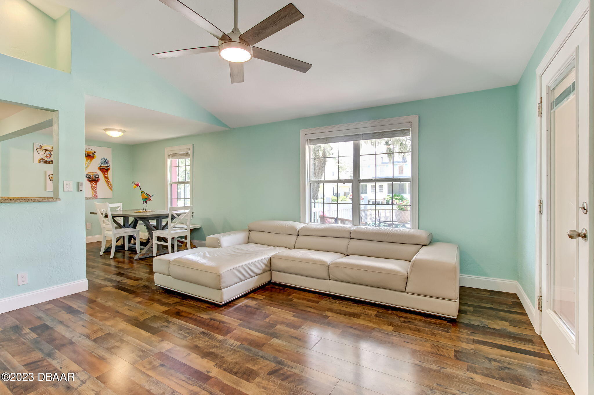 827 South Beach Street Daytona Beach, FL 32114 - Photo 6 of 40 a living room with furniture and a large window