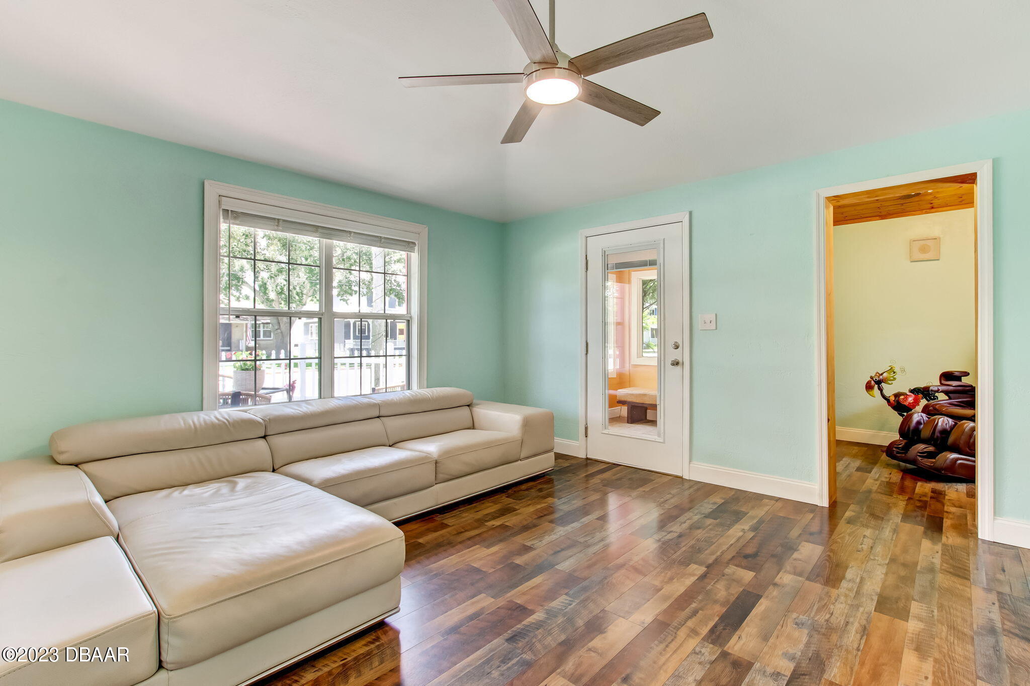 827 South Beach Street Daytona Beach, FL 32114 - Photo 8 of 40 a living room with furniture and a window