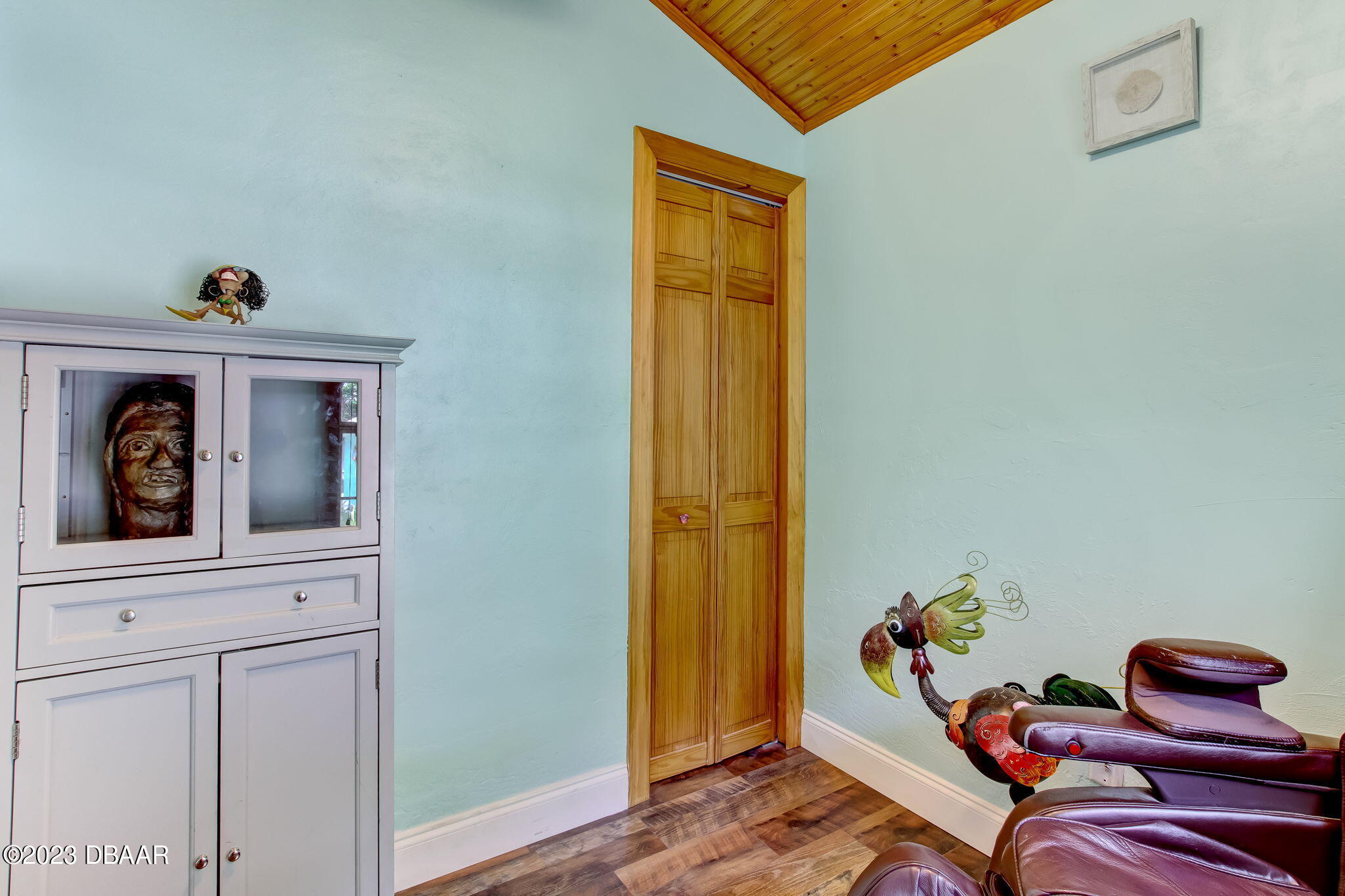 827 South Beach Street Daytona Beach, FL 32114 - Photo 10 of 40 a living room with furniture and wooden floor
